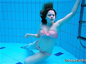 spectacular female shows beautiful body underwater