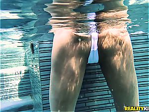 buxomy swimsuit stunner goes deep ass fucking with a tying dude