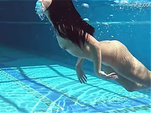 Jessica Lincoln petite inked Russian nubile in the pool